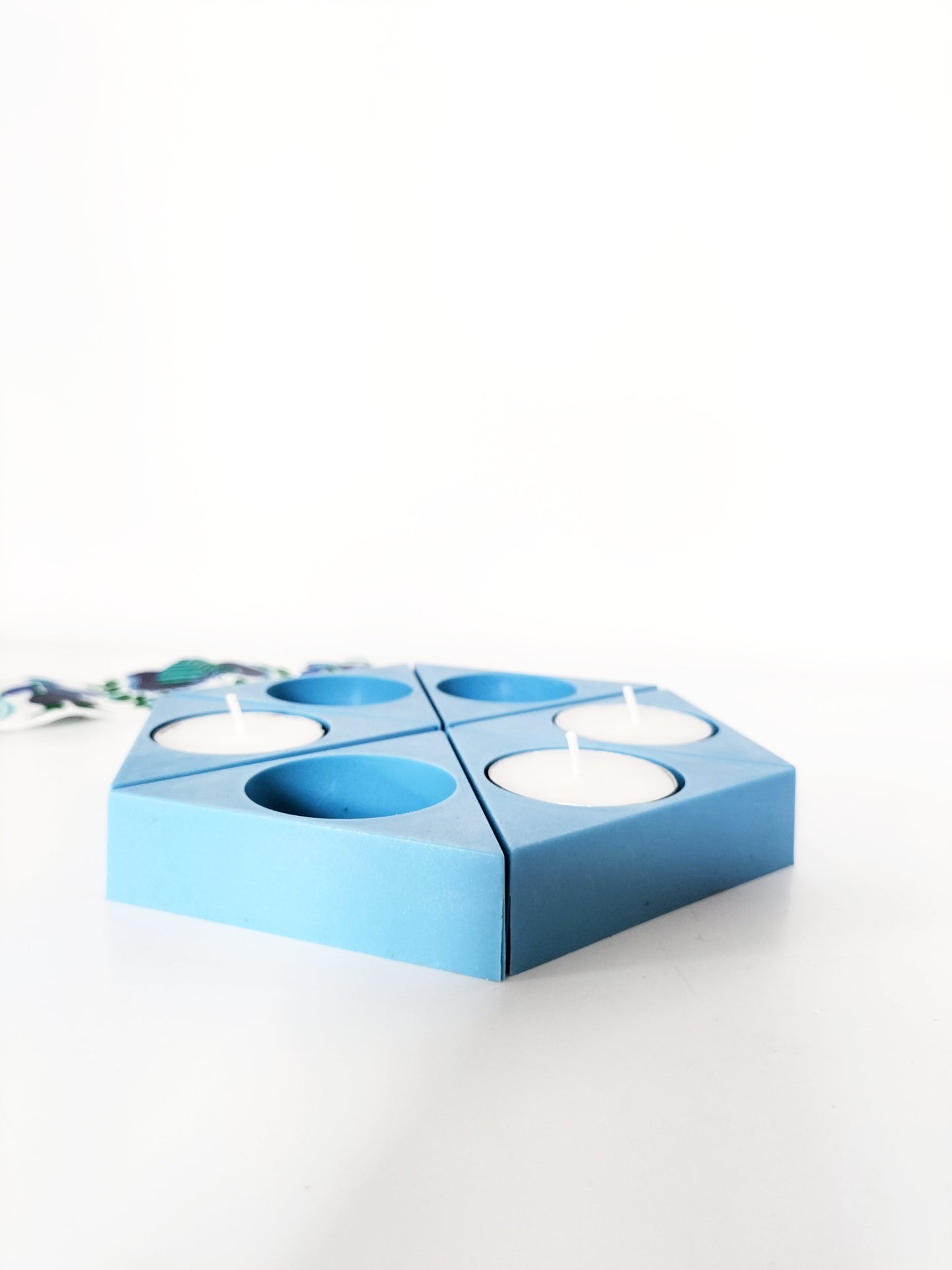 Enfilade de 6 bougeoirs en plastique