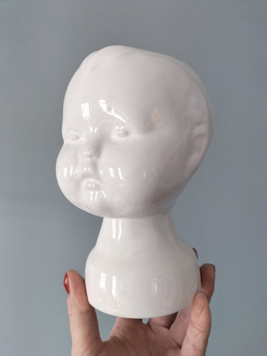 Cache-pot tête de bébé