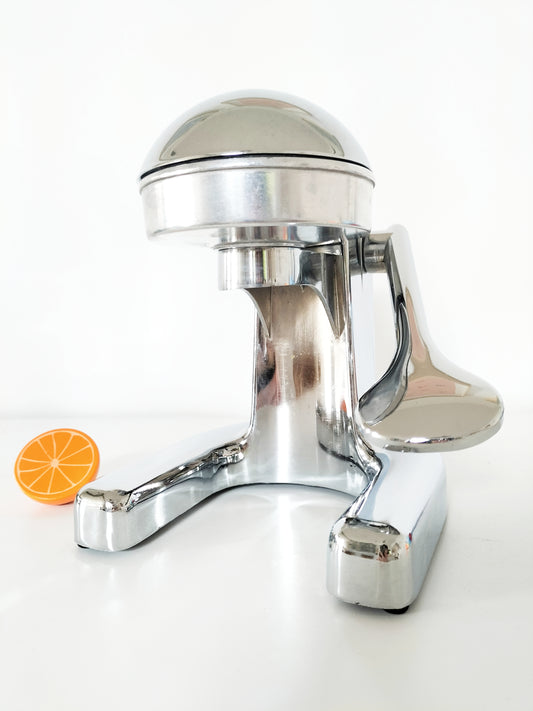 Presse-agrumes manuel en inox