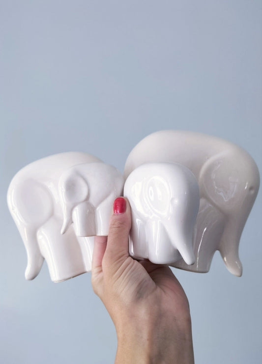 Ensemble de 4 éléphants en céramique style Sgrafo