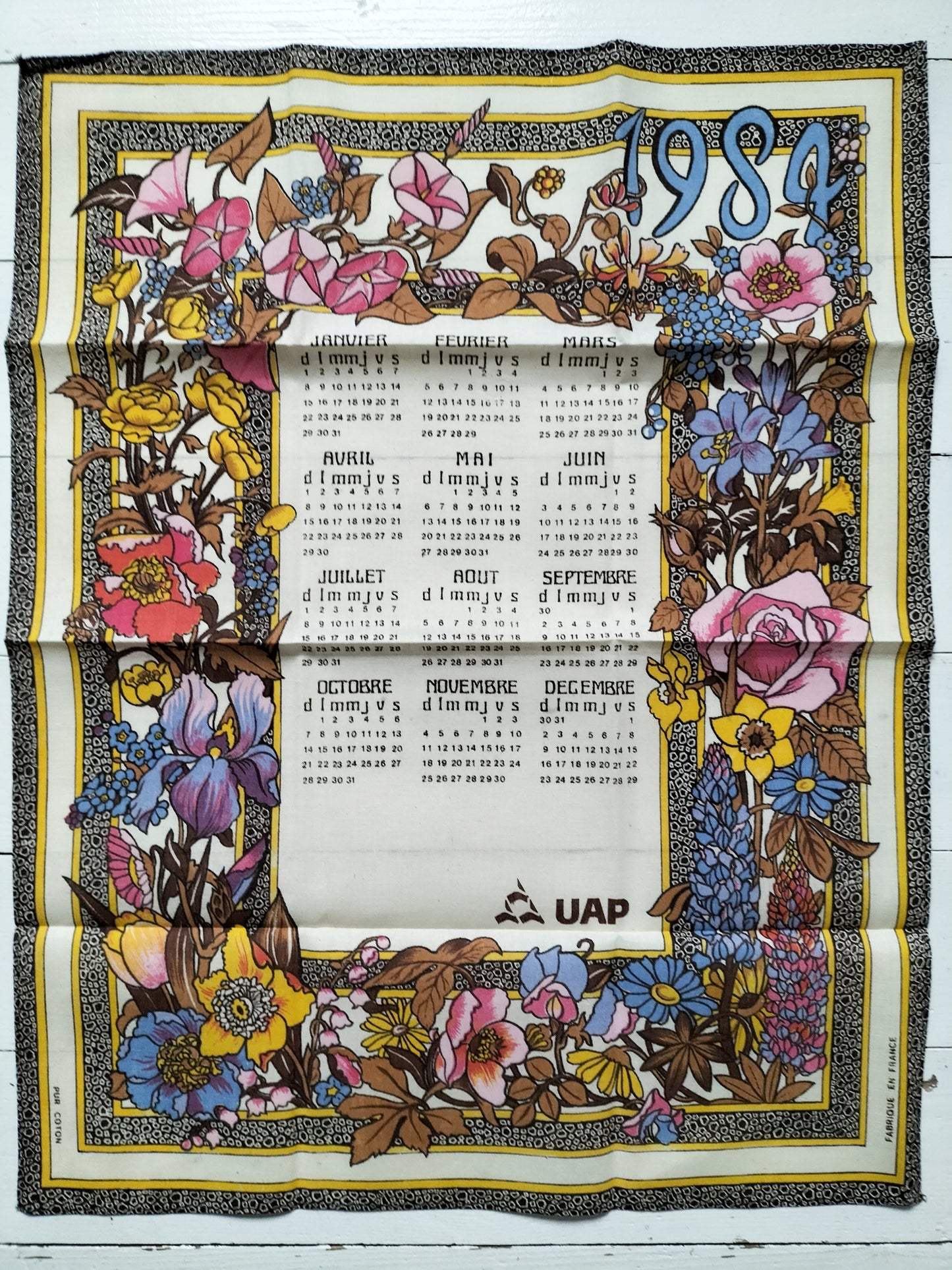 Torchon calendrier 1984