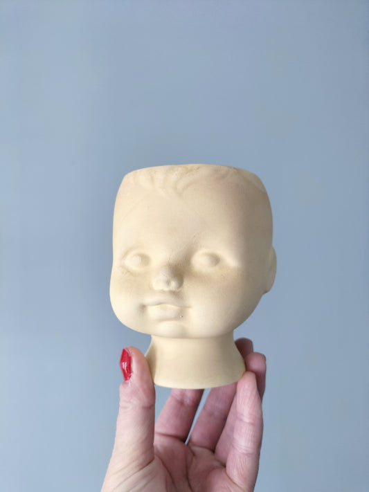 Petit cache-pot tête de bébé