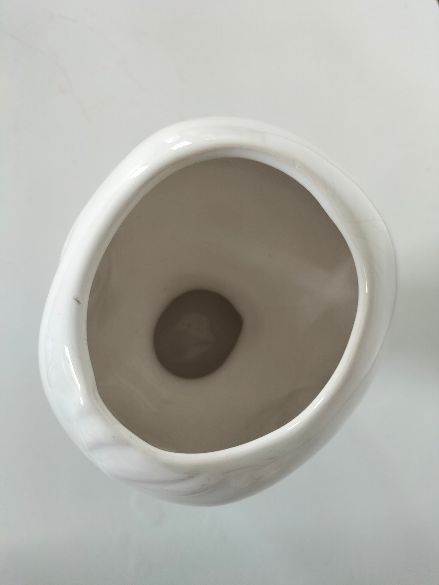 Cache-pot tête de bébé