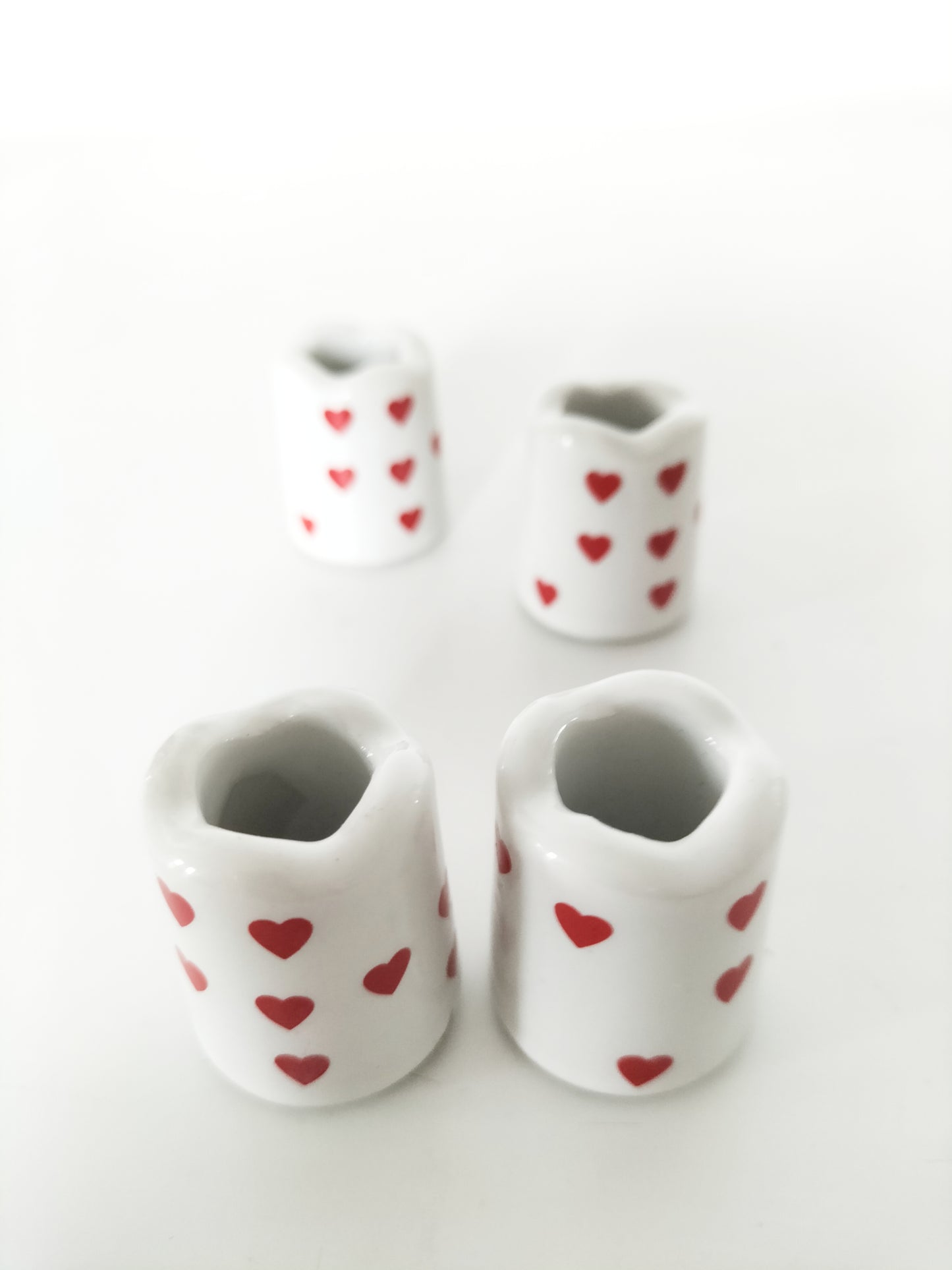Duo de mini-bougeoirs en porcelaine + bougies