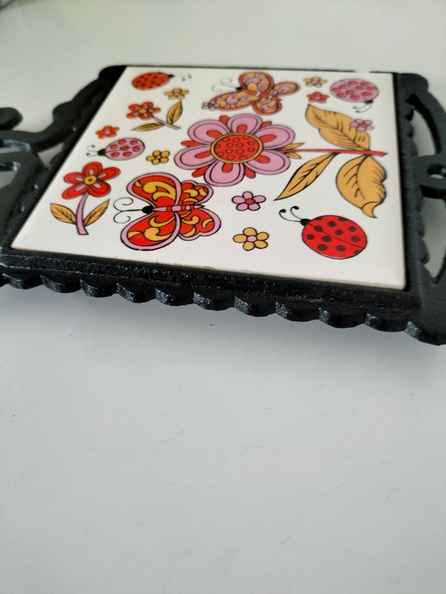 Dessous de plat fonte et carreau en céramique pour Adeline ?
