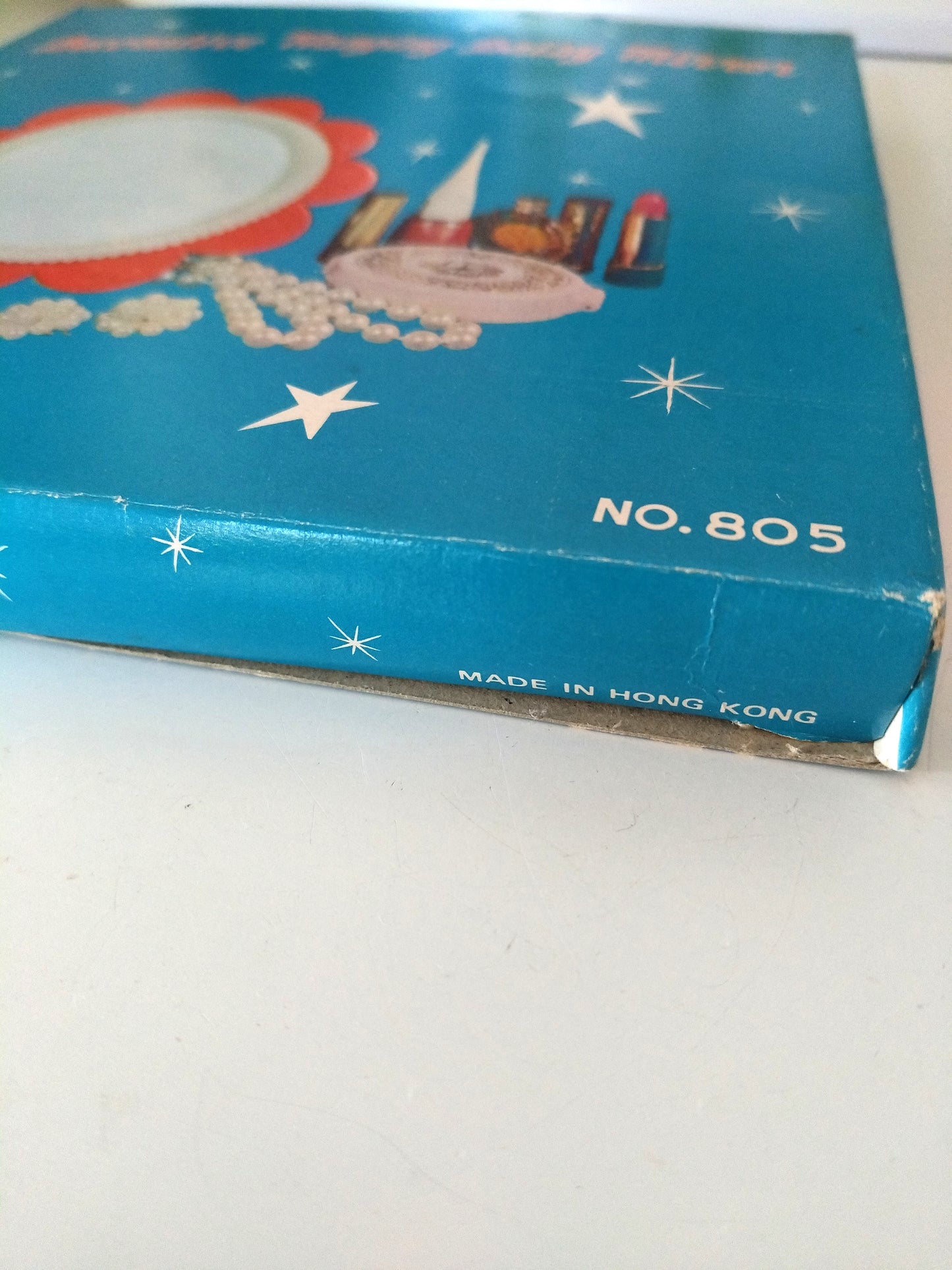 Petit miroir fleur mural ou à poser en plastique made in Hong Kong