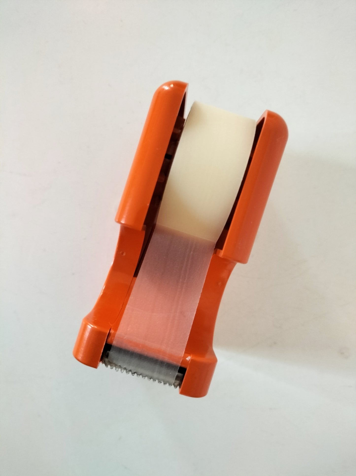 Dérouleur de papier collant en plastique orange