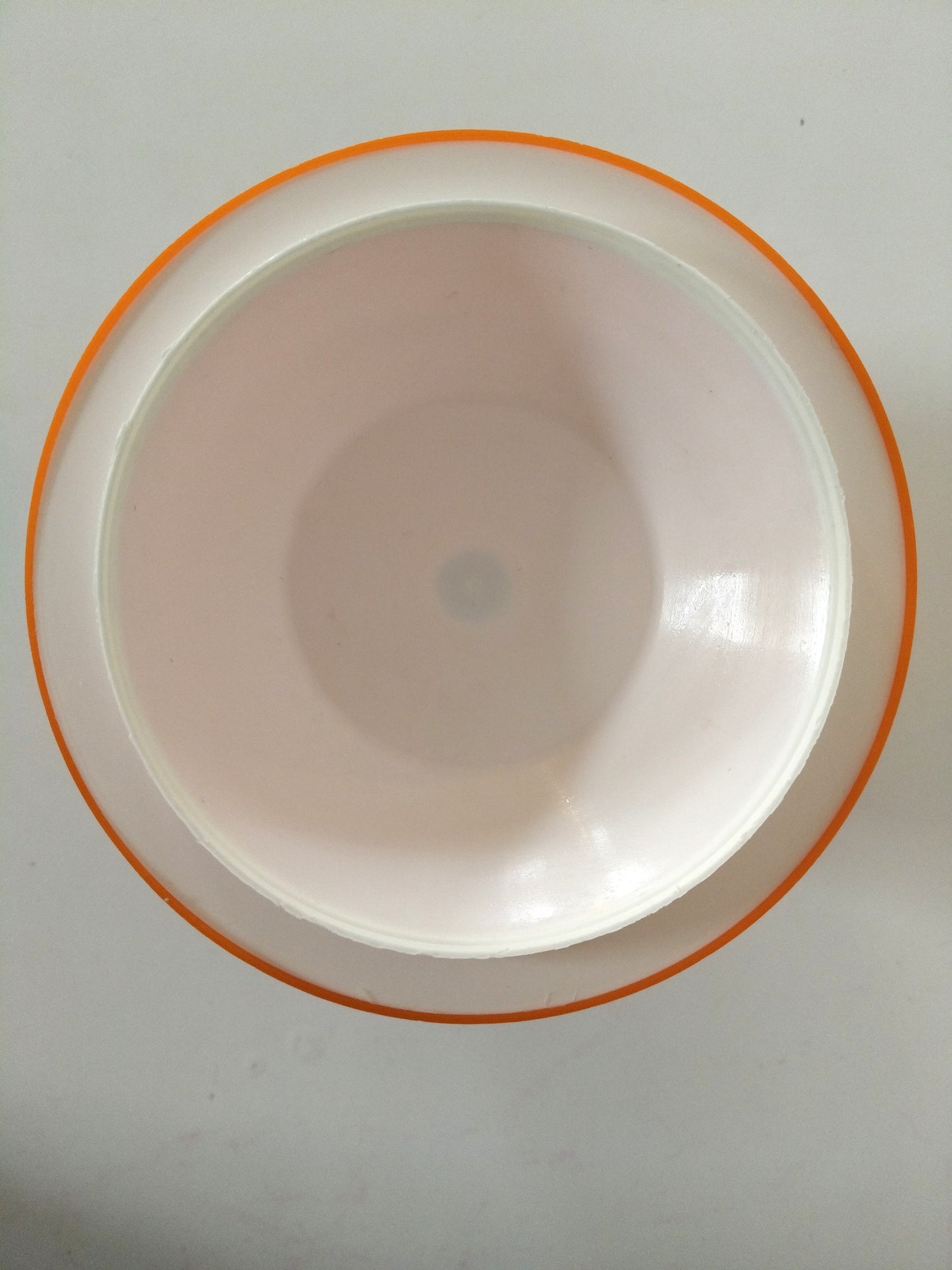 Pomme à glaçons en plastique rouge ou orange au choix