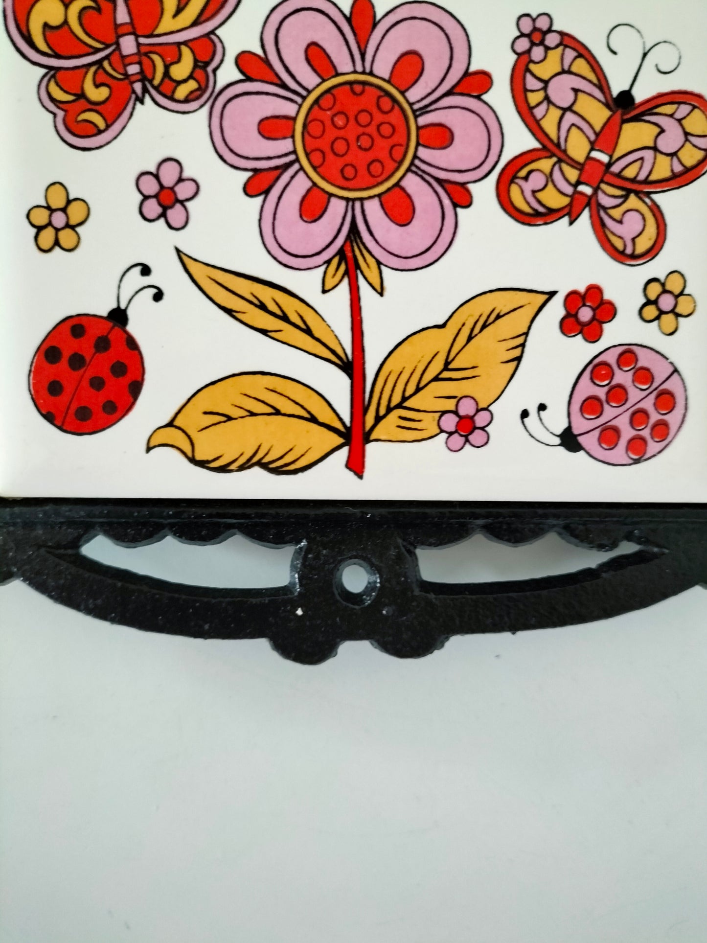 Dessous de plat fonte et carreau en céramique pour Adeline ?