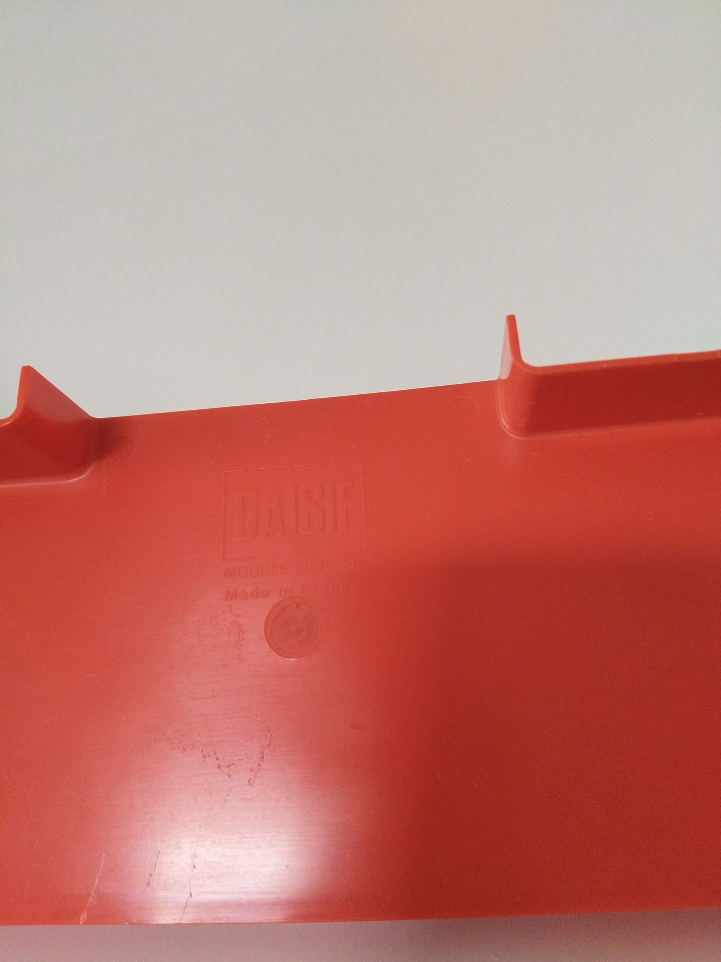 Petit rangement mural en plastique orange Daisif