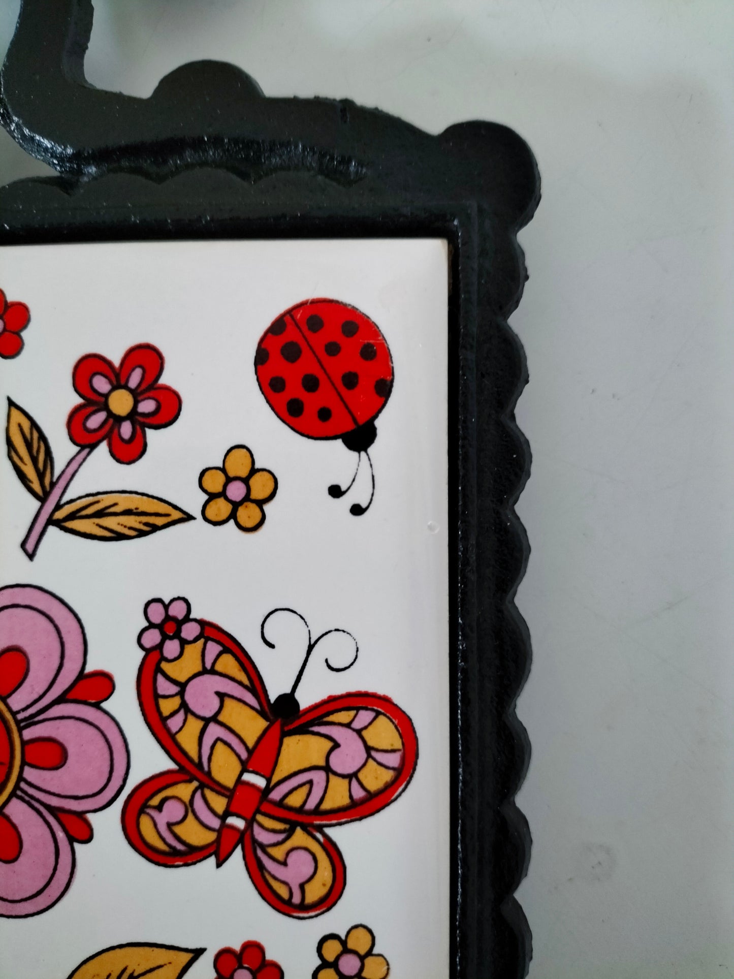 Dessous de plat fonte et carreau en céramique pour Adeline ?