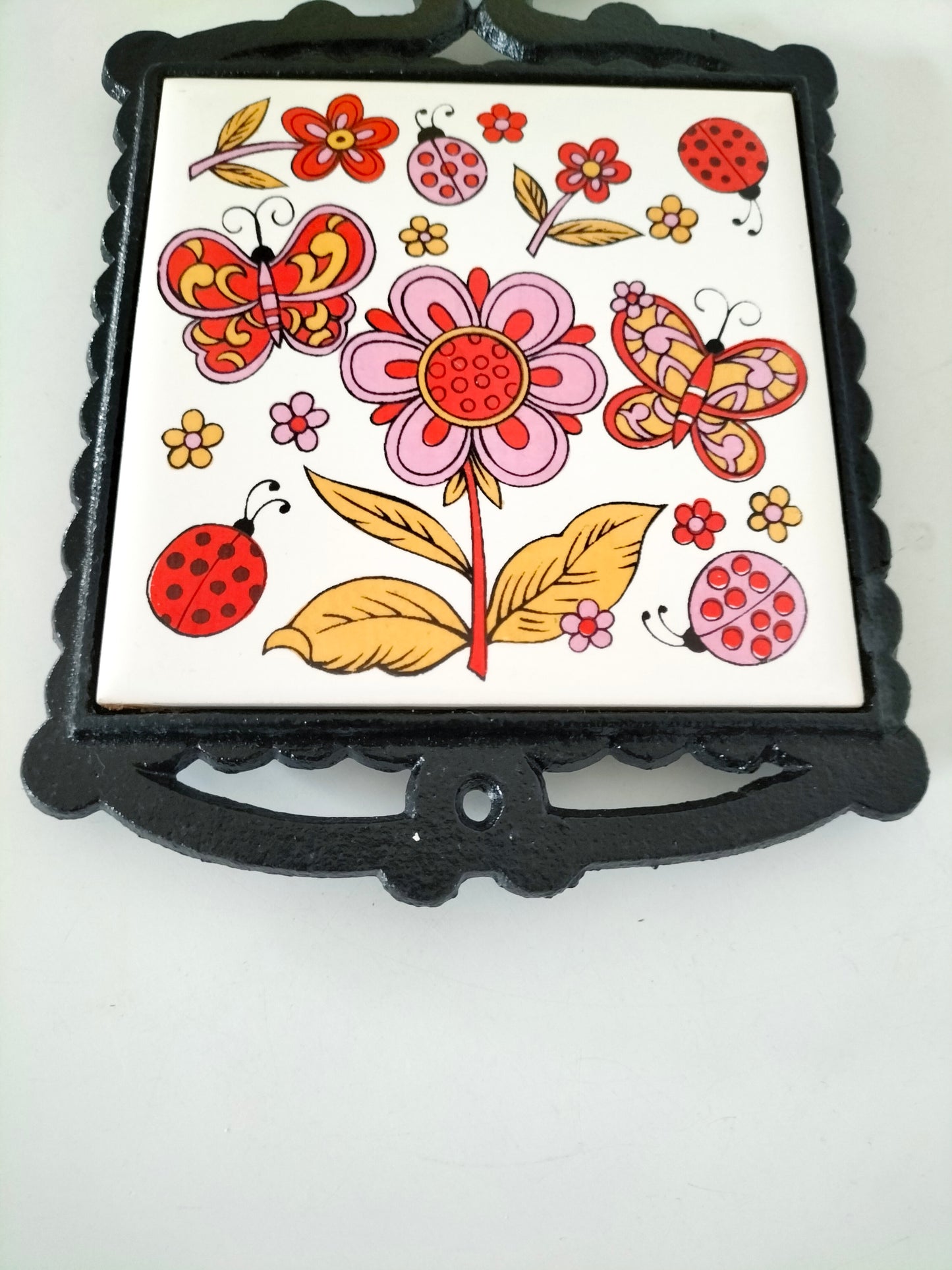 Dessous de plat fonte et carreau en céramique pour Adeline ?