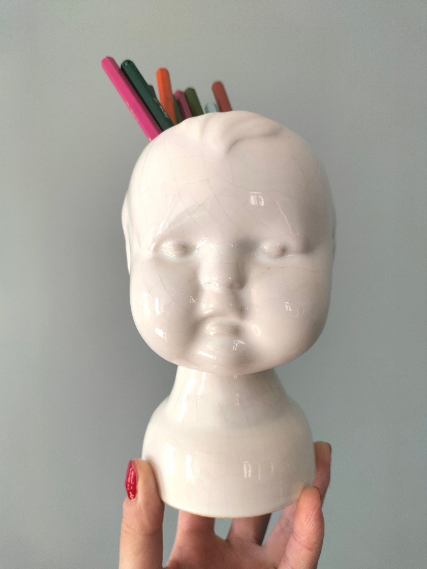 Cache-pot tête bébé