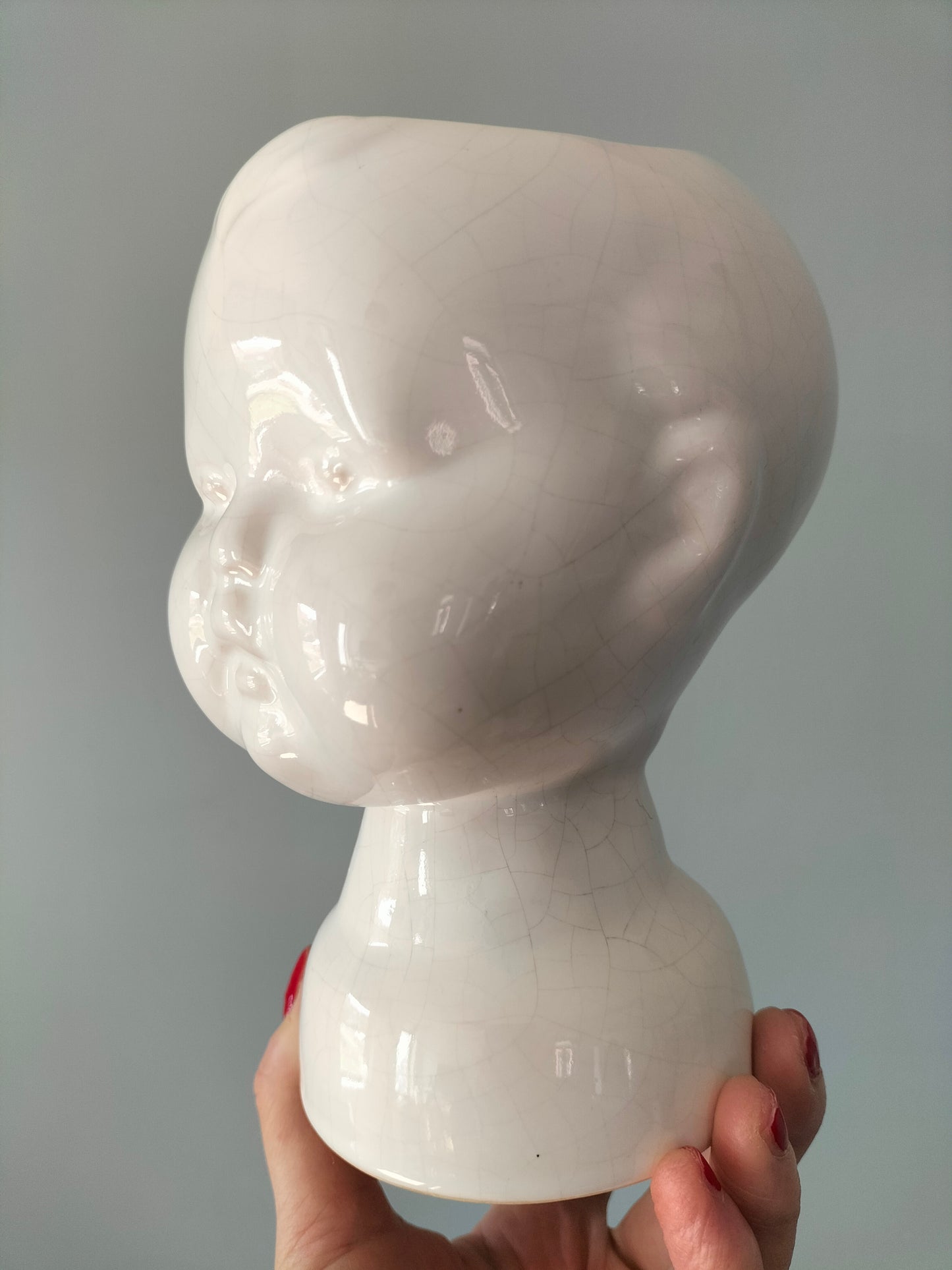 Cache-pot tête bébé