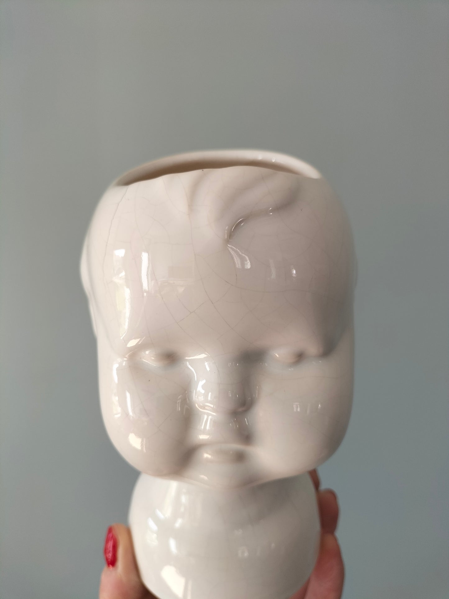 Cache-pot tête bébé