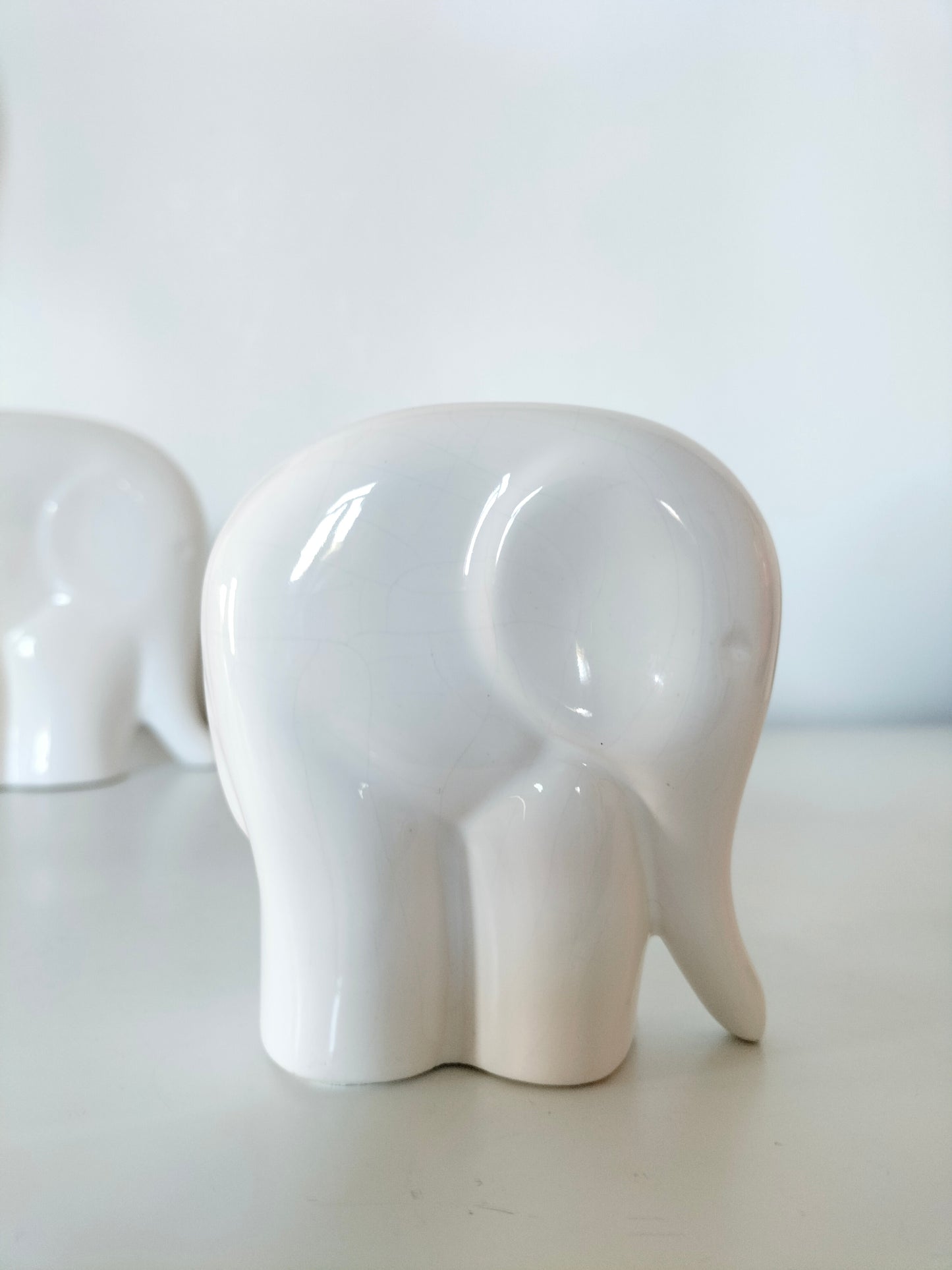 Ensemble de 4 éléphants en céramique émaillée