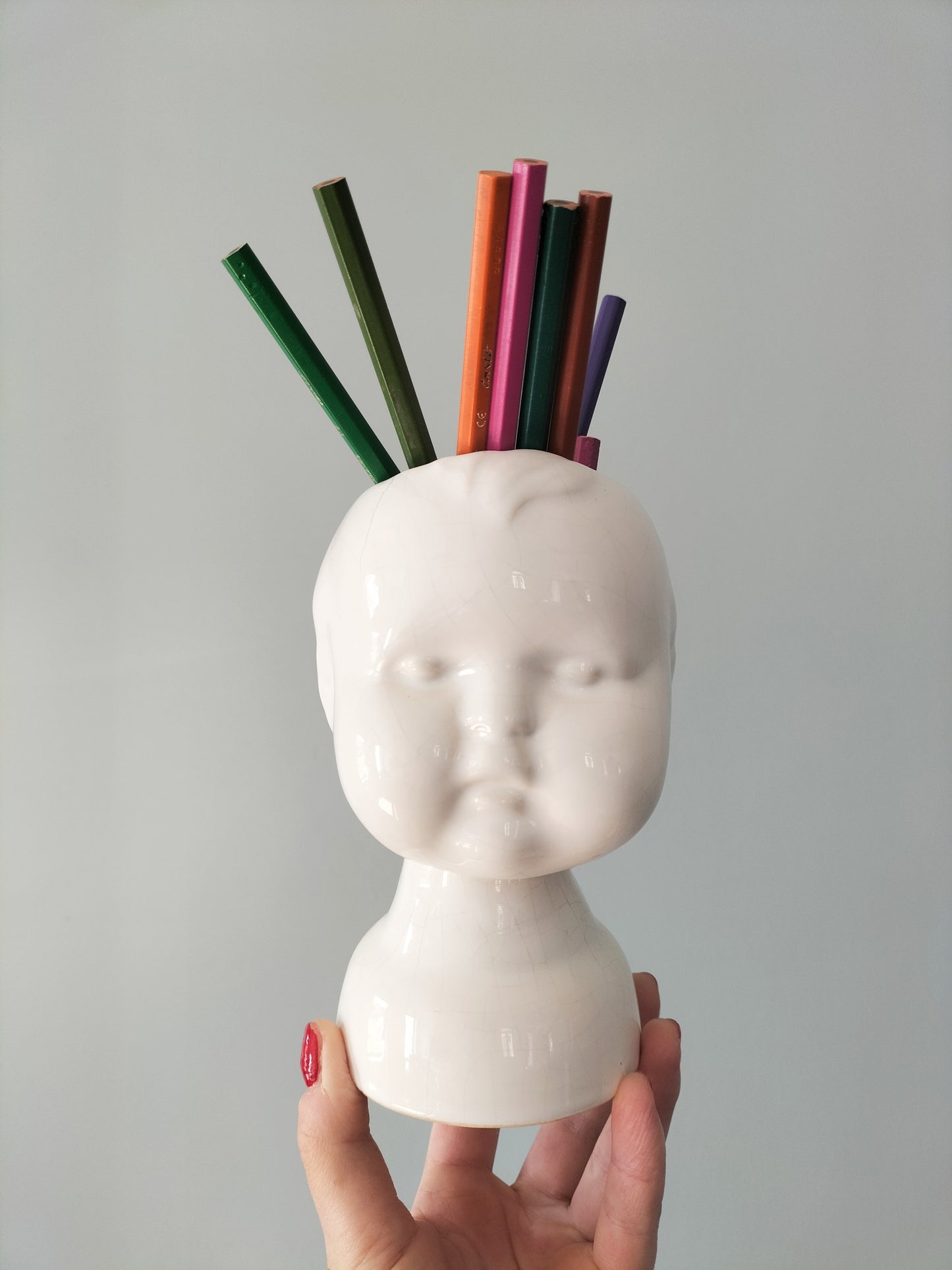 Cache-pot tête bébé