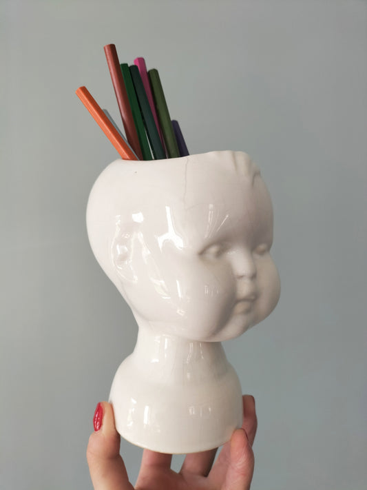 Cache-pot tête bébé