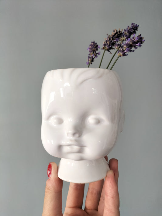 Cache-pot tête de bébé