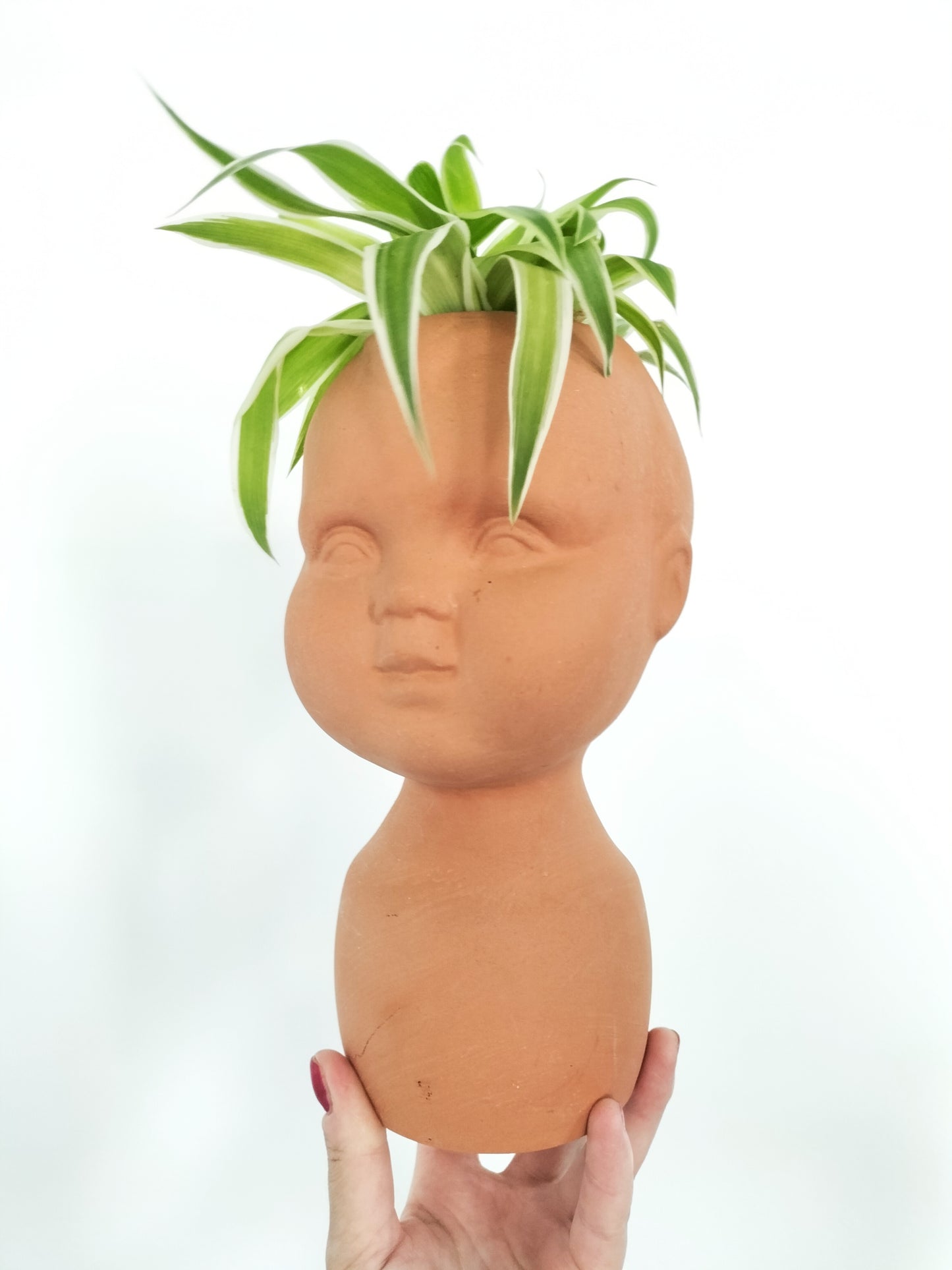 Cache-pot tête bébé