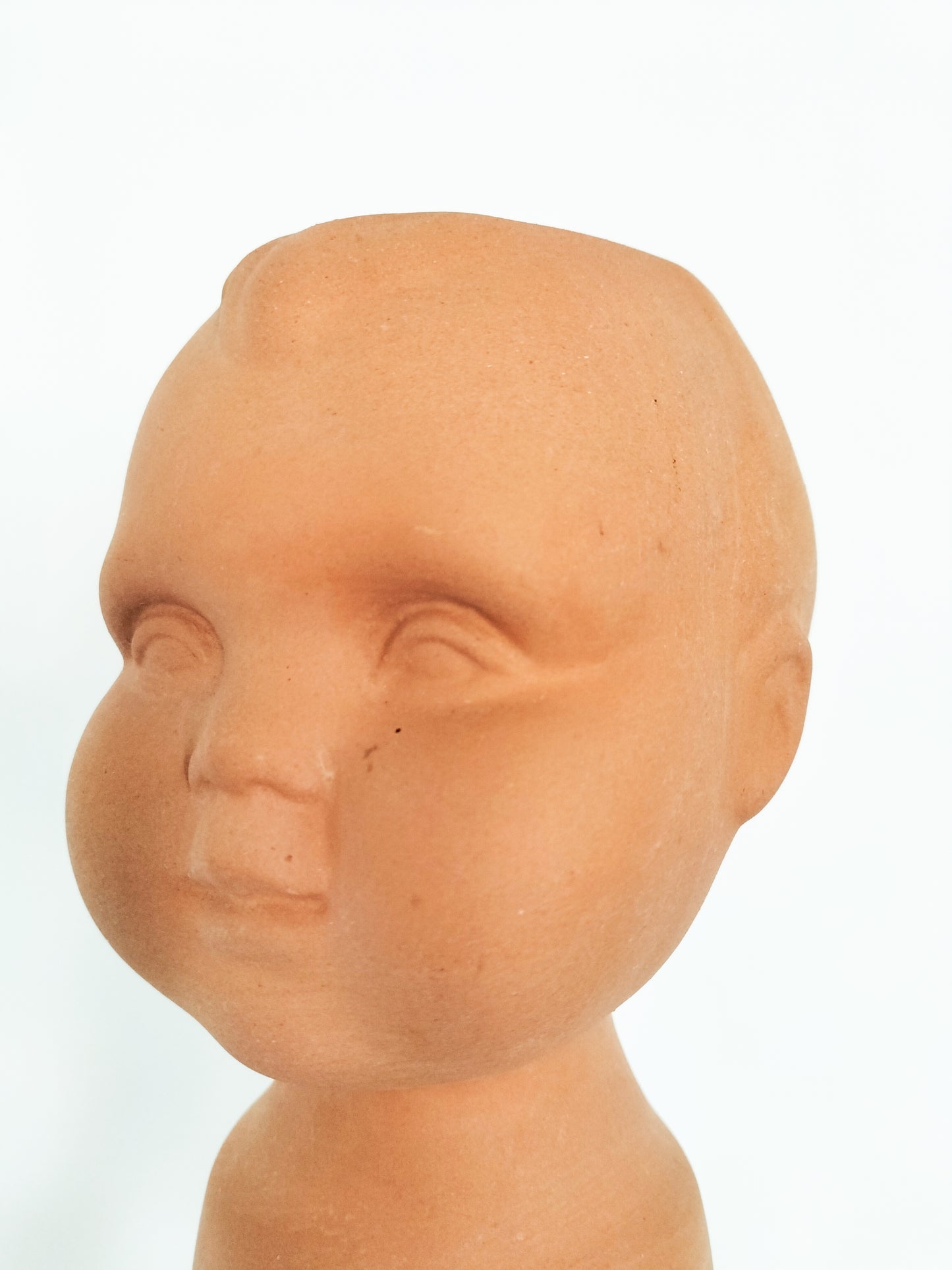 Cache-pot tête bébé