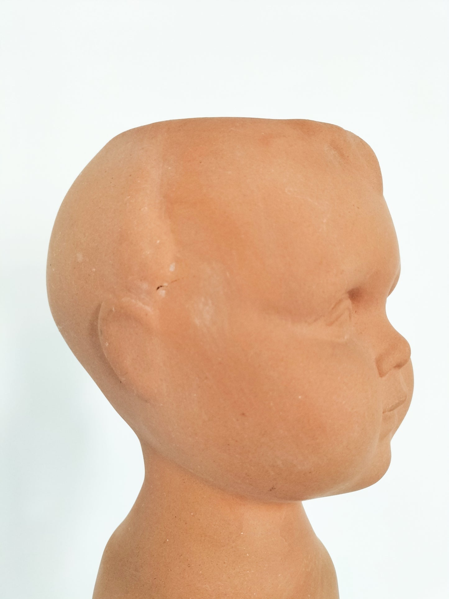 Cache-pot tête bébé