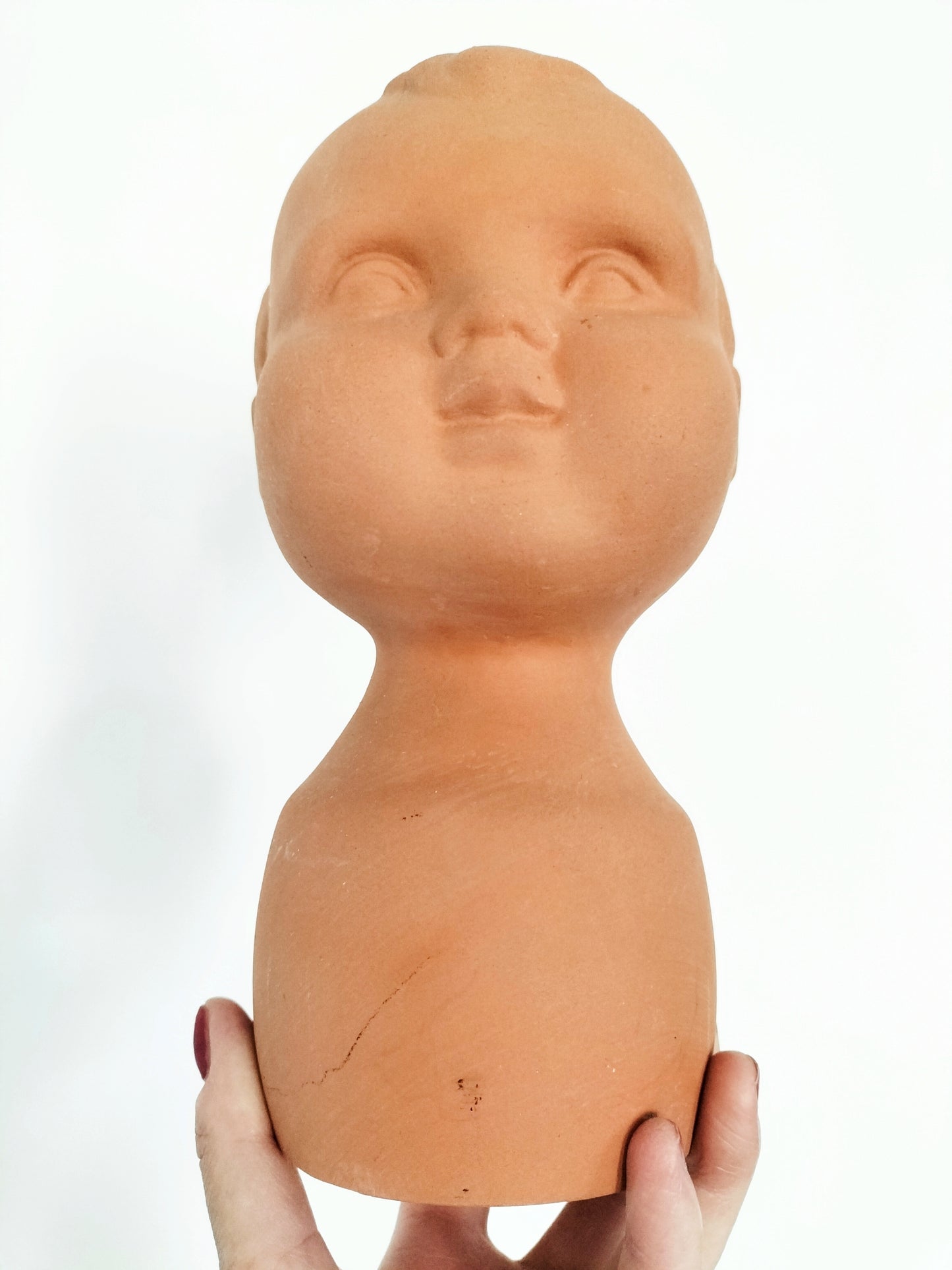 Cache-pot tête bébé