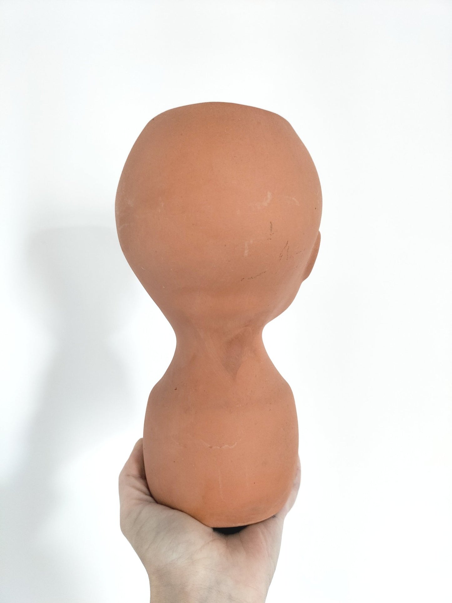 Cache-pot tête bébé