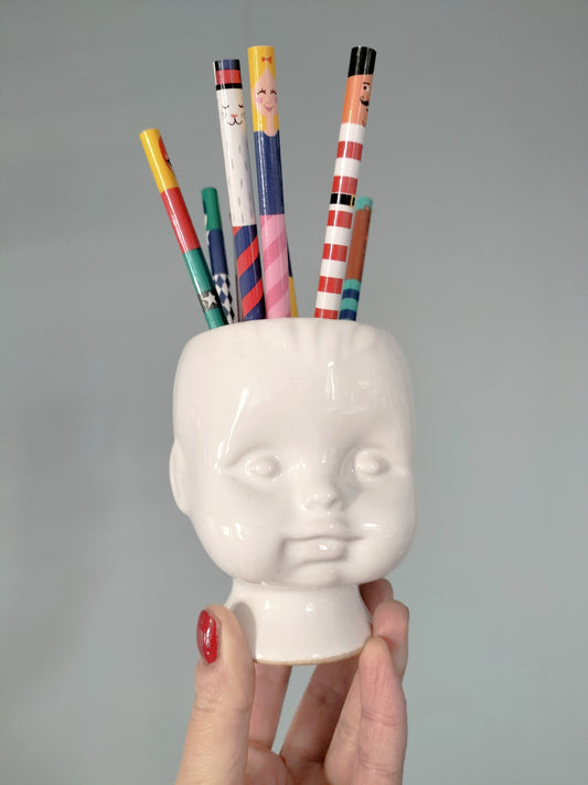 Cache-pot tête bébé