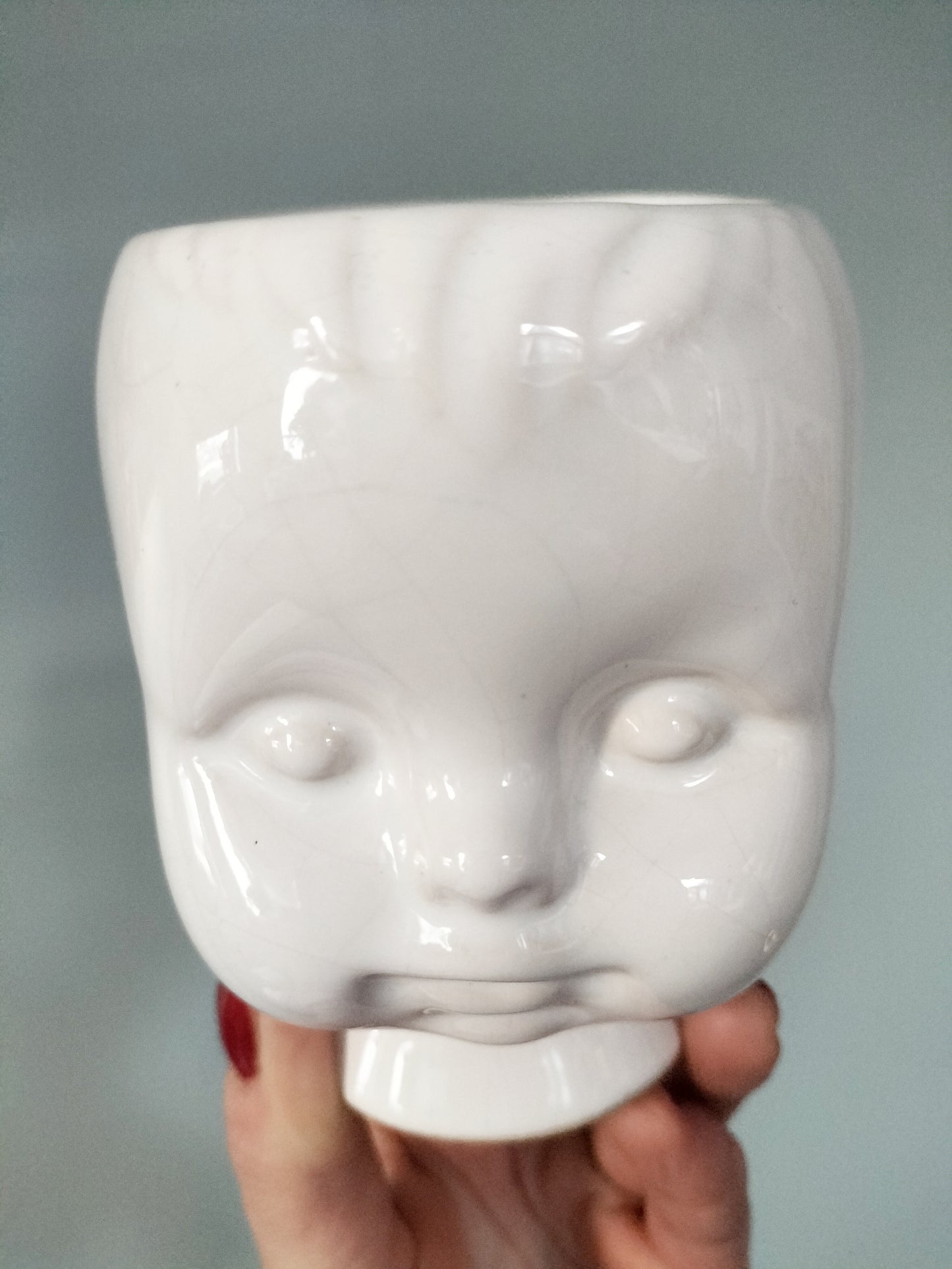Cache-pot tête bébé