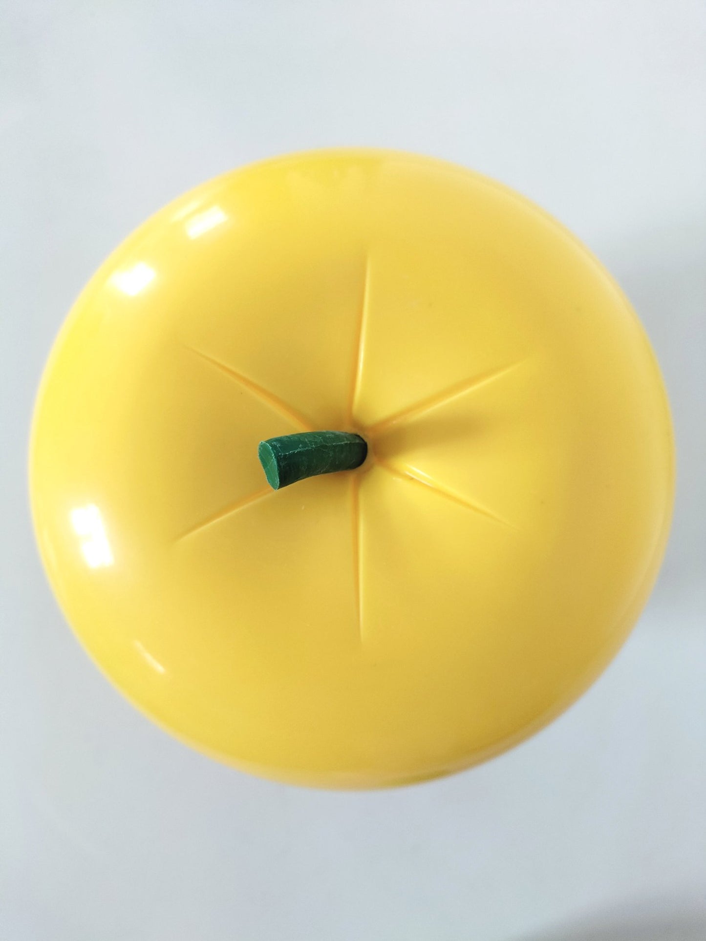 Pomme à glaçons plastique jaune