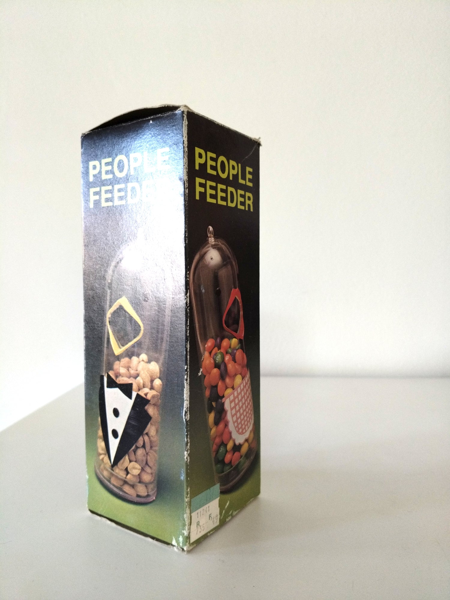 Distributeur de friandises oiseau "people feeder" en plastique Hong Kong - cetaitmieuxavant