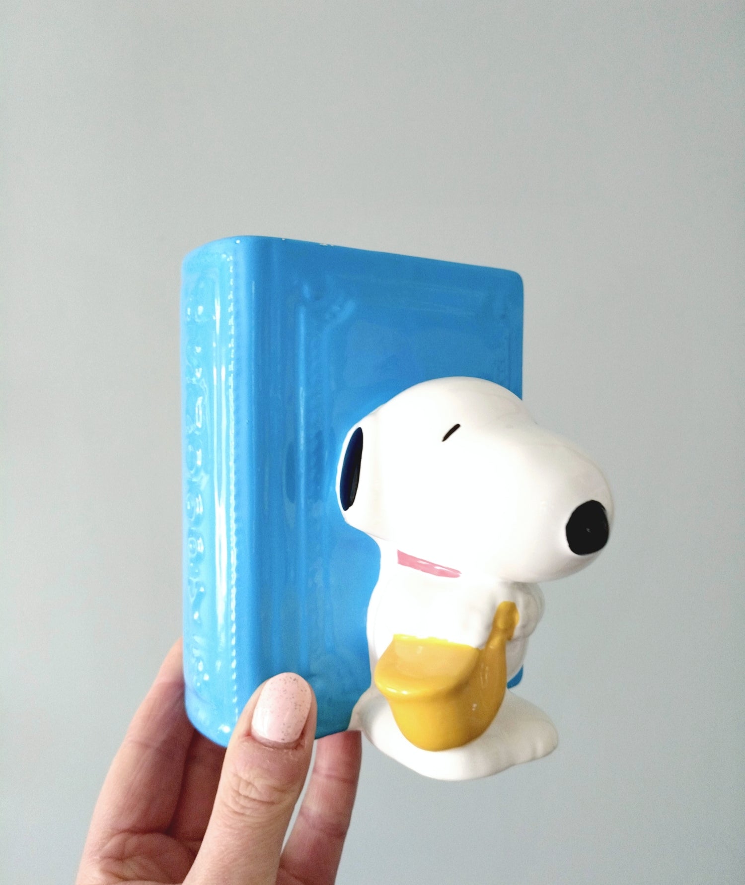 Tirelire Snoopy saxophoniste livre en céramique Peanuts United Feature Syndicate Denz - cetaitmieuxavant