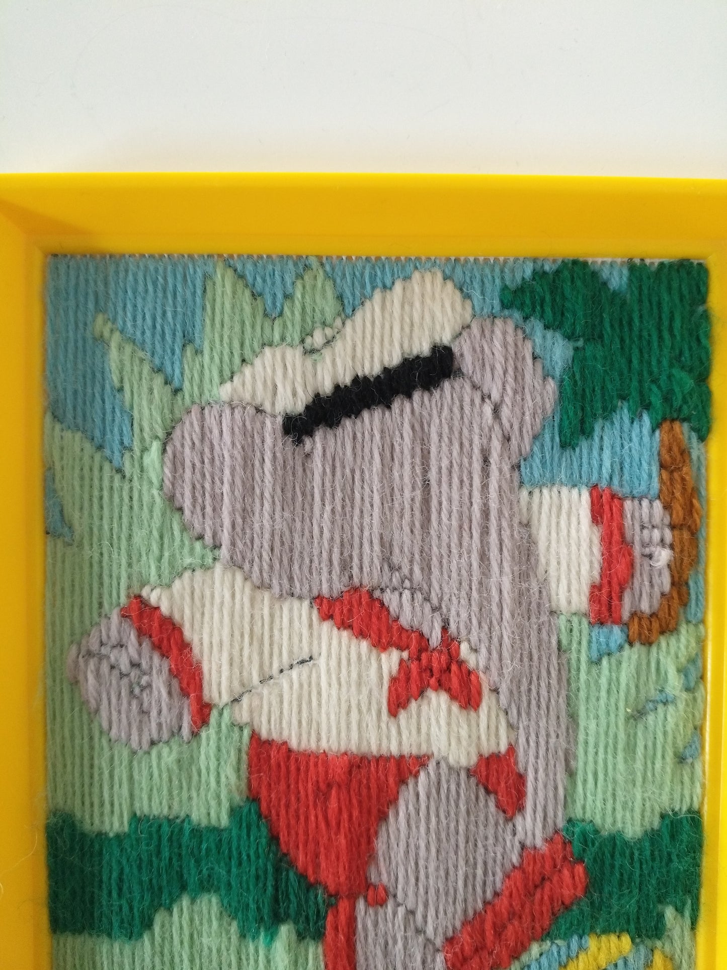 Ancienne broderie de Babar encadrée