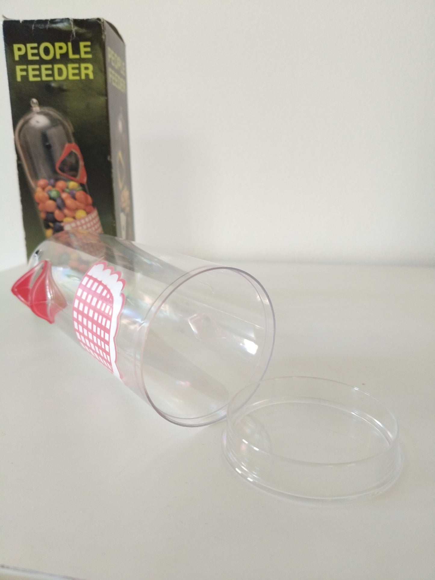 Distributeur de friandises oiseau "people feeder" en plastique Hong Kong - cetaitmieuxavant