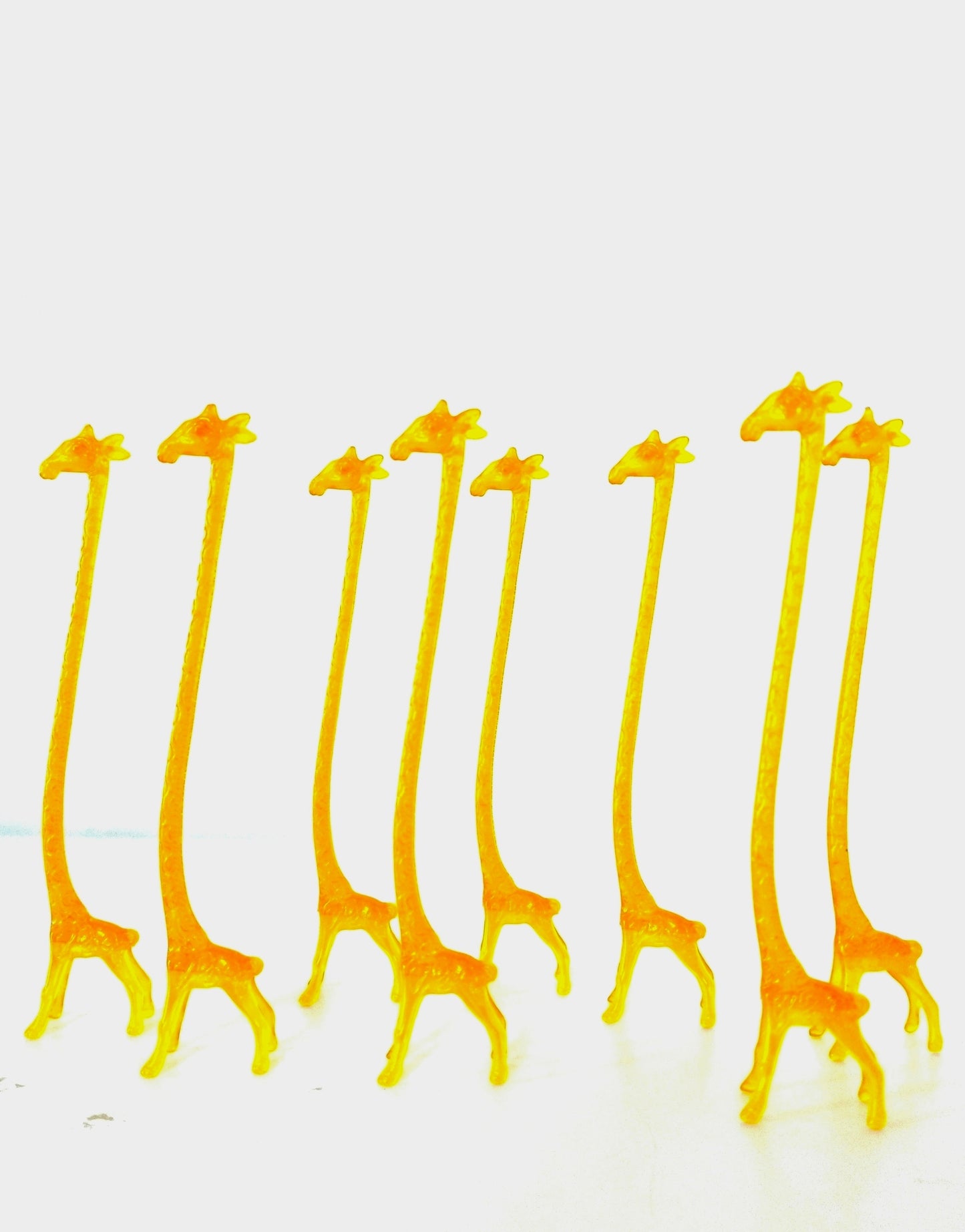 4 agitateurs à cocktail girafe en plastique (2 lots dispos)