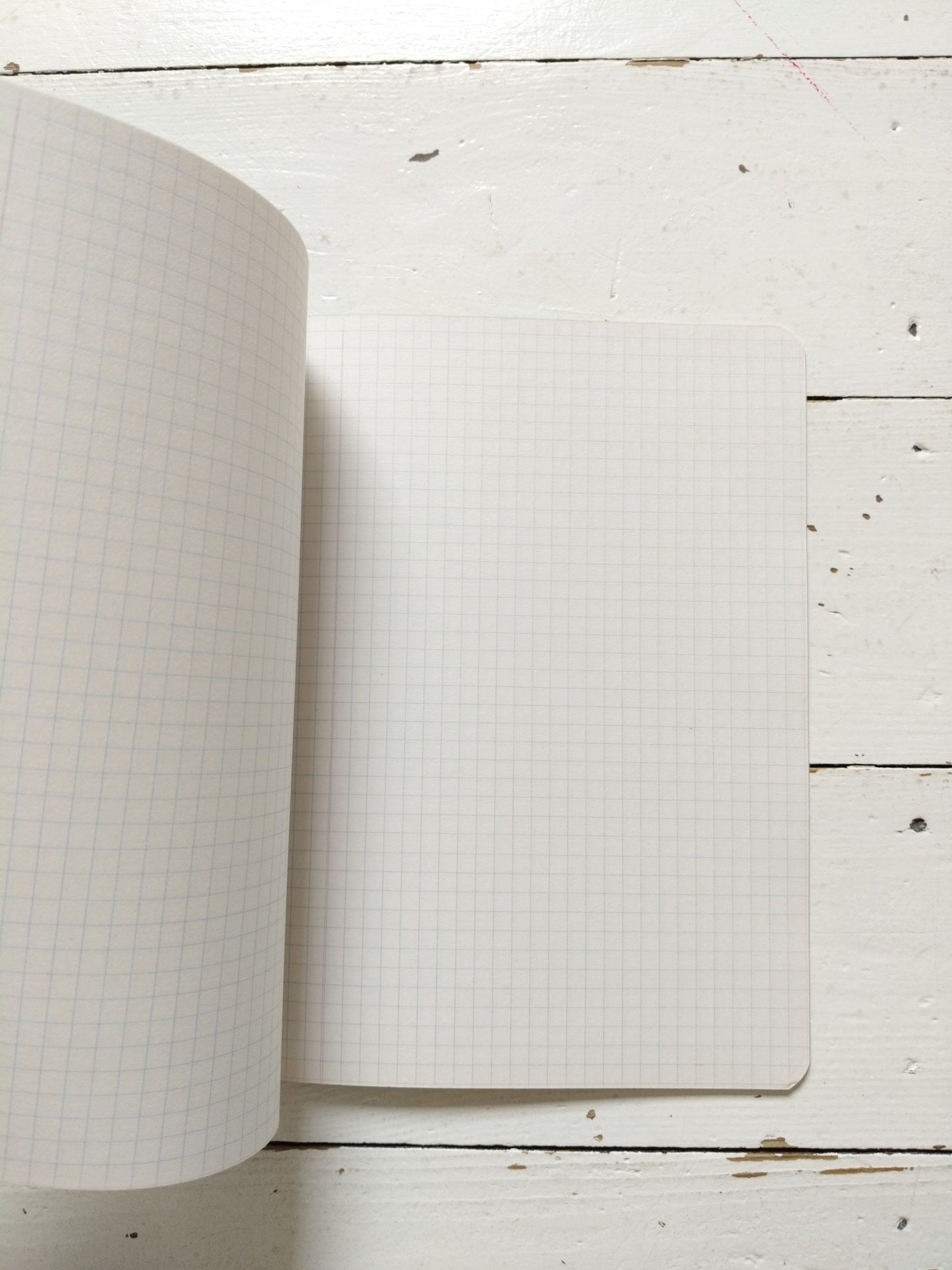 Cahier A5 quadrillé au choix