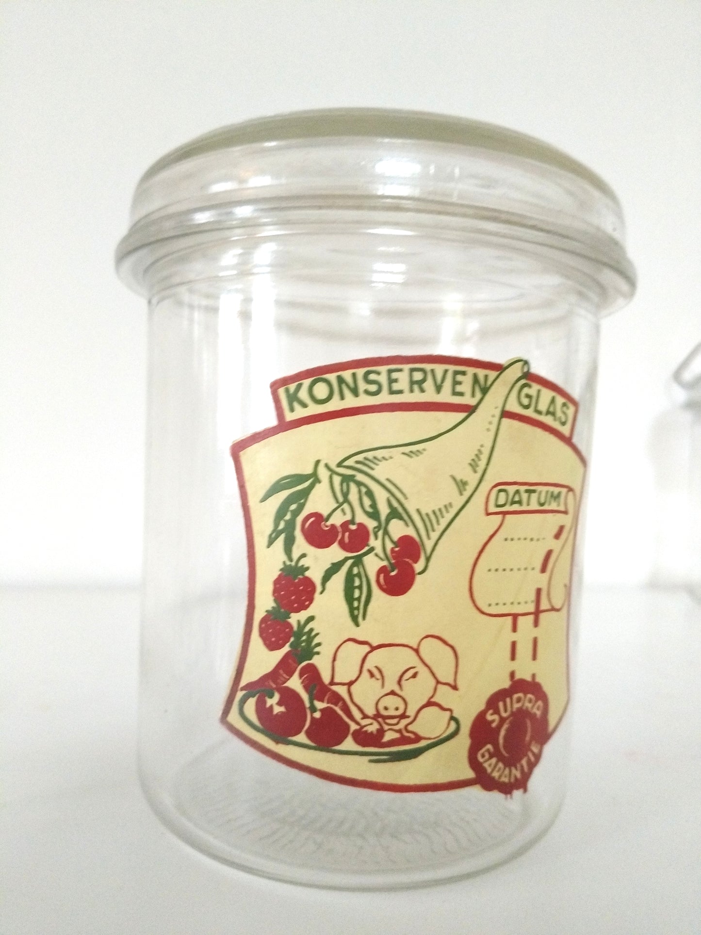 Ancien bocal de conservation en verre à l'unité