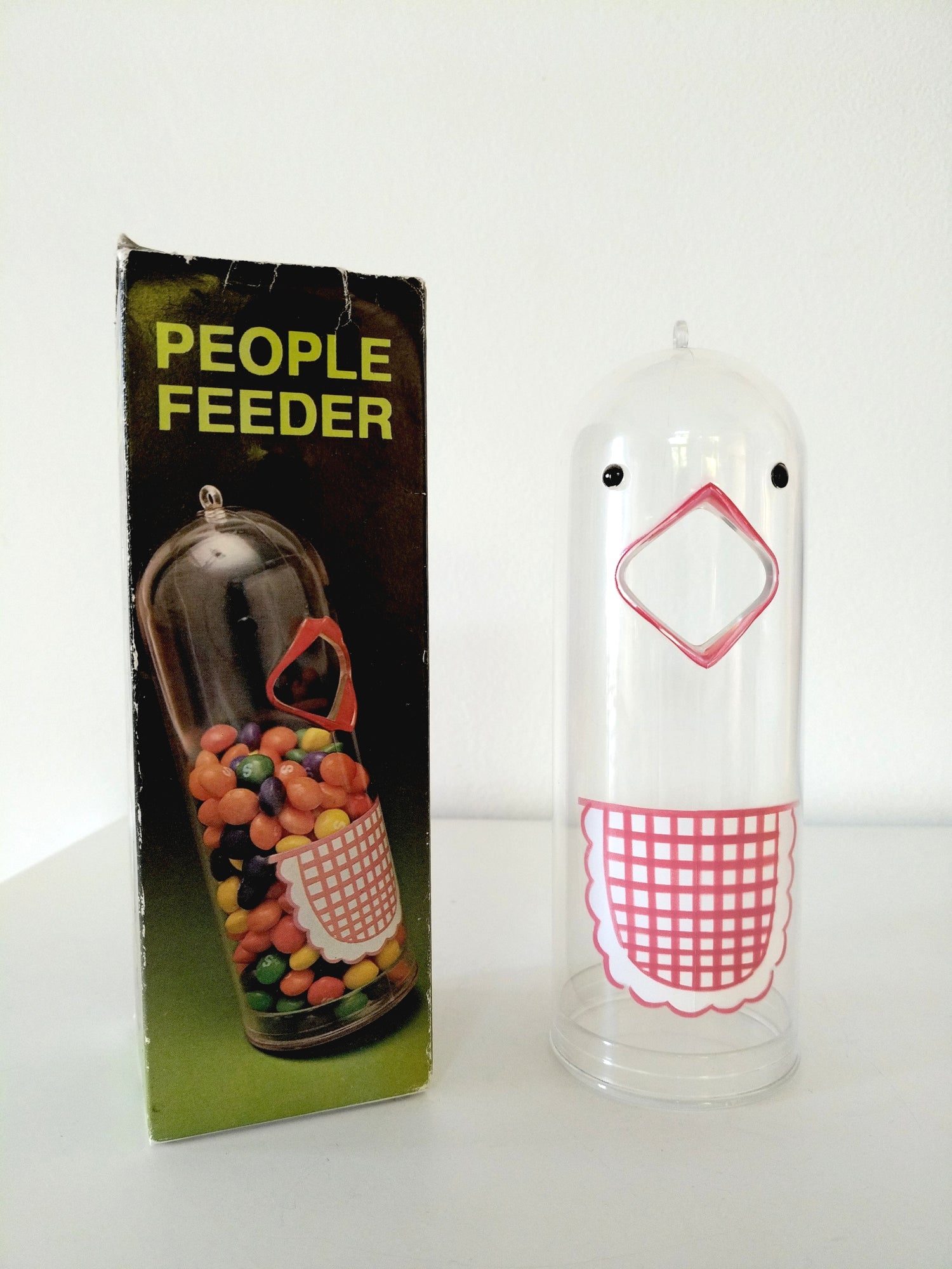 Distributeur de friandises oiseau "people feeder" en plastique Hong Kong - cetaitmieuxavant