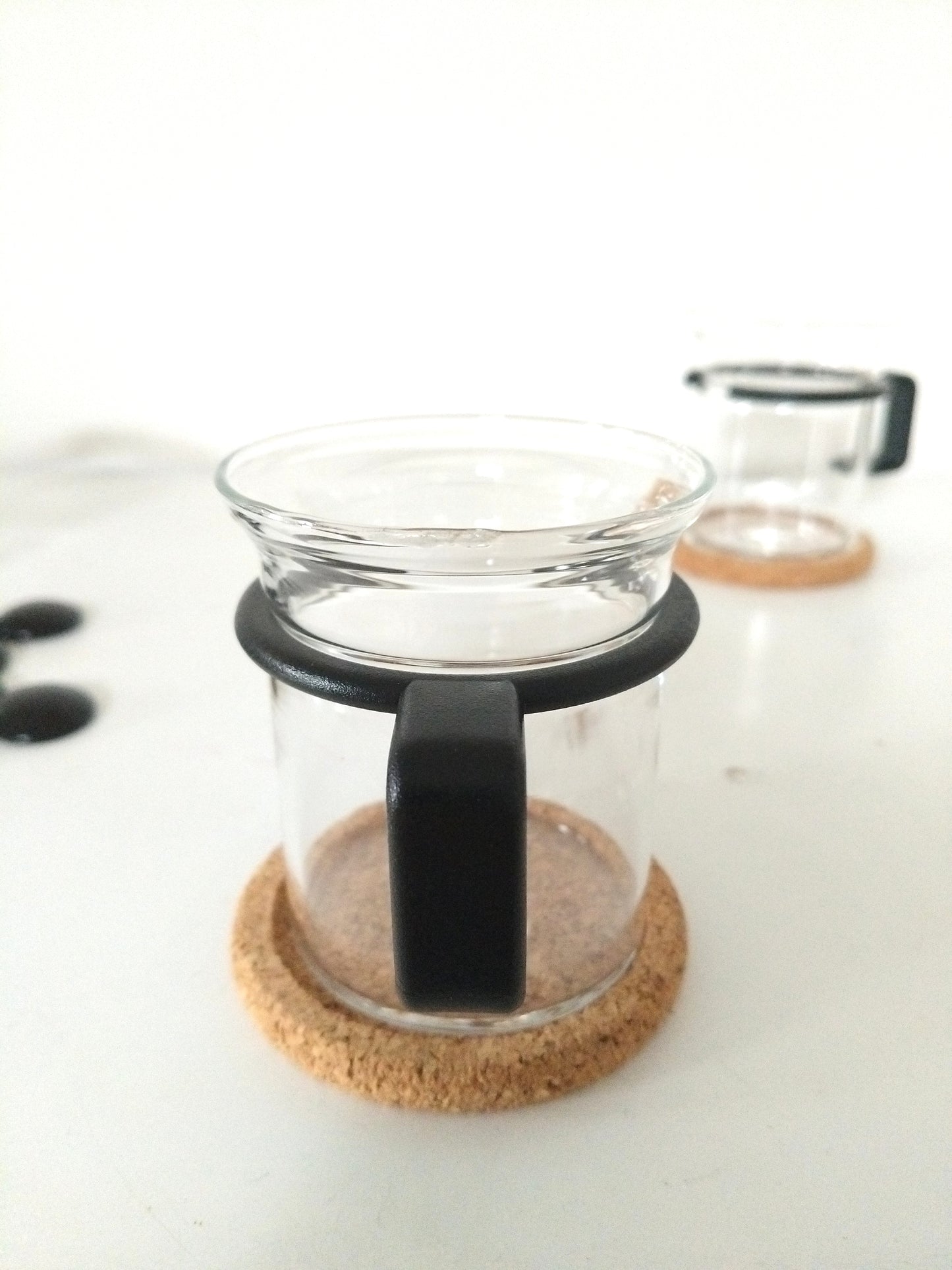 Ensemble de 4 tasses en verre + touillettes + sous-tasses en liège Bodum