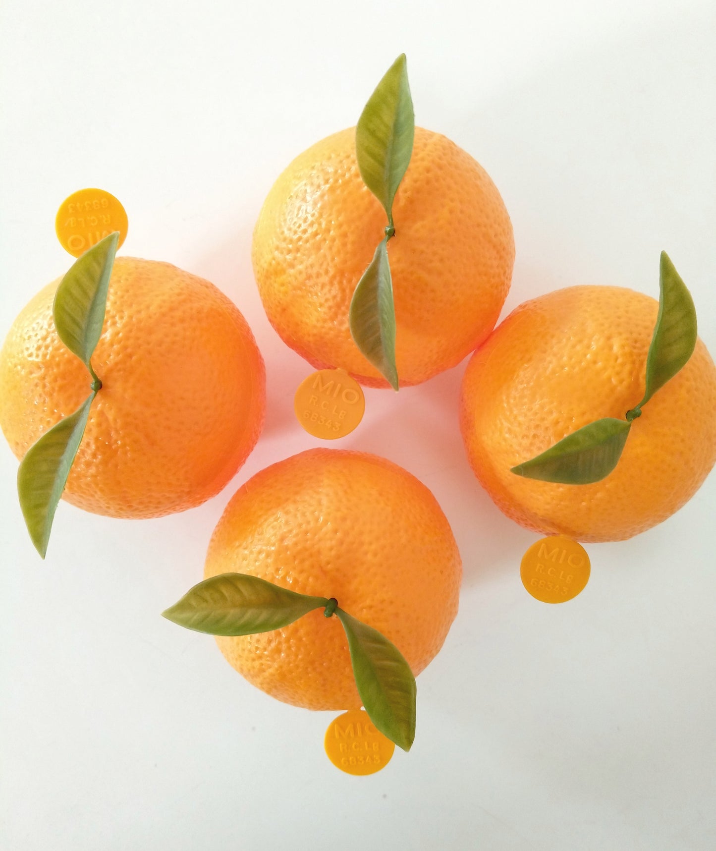 Petite boîte en forme d'orange en plastique Mio à l'unité