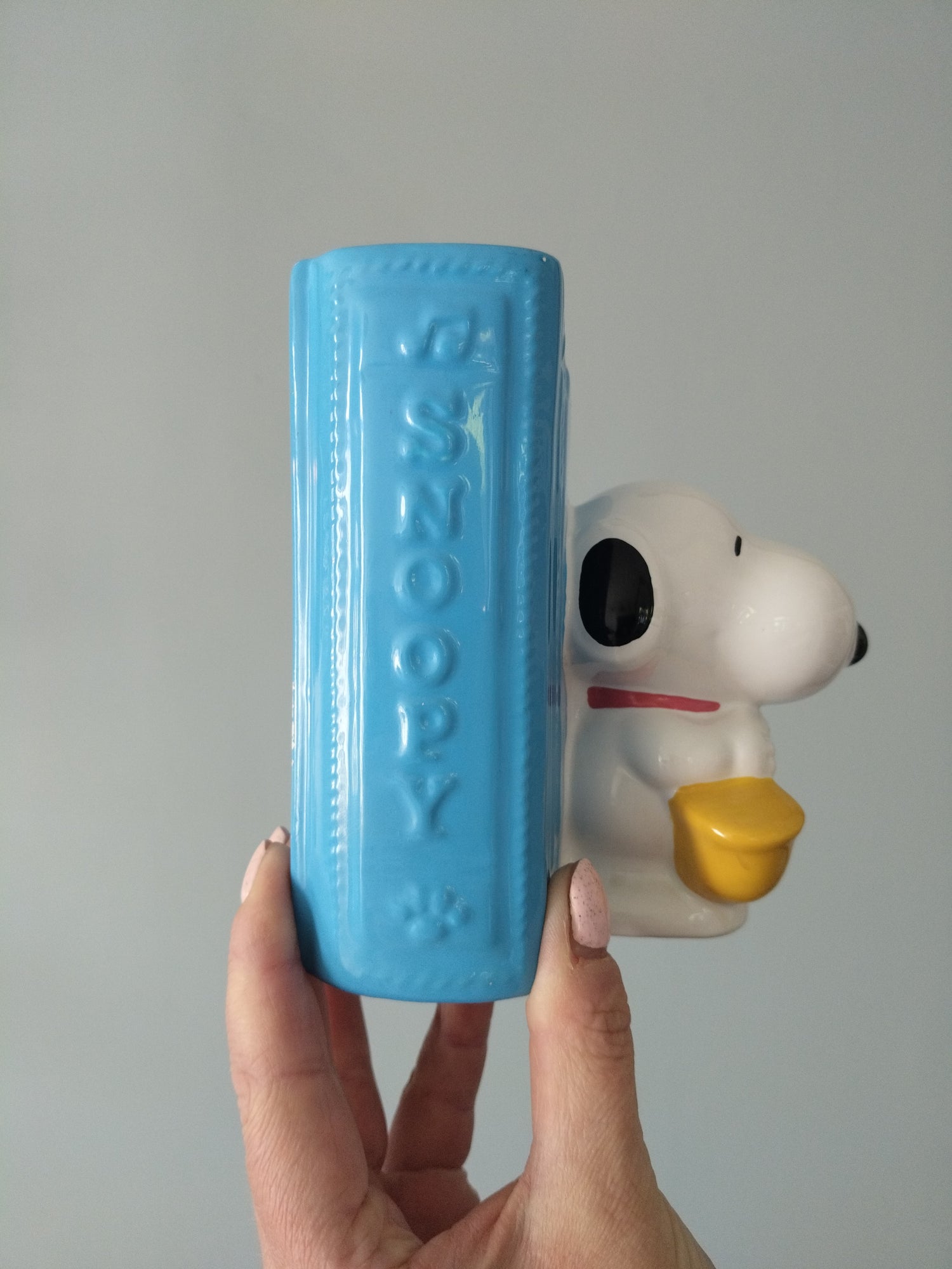 Tirelire Snoopy saxophoniste livre en céramique Peanuts United Feature Syndicate Denz - cetaitmieuxavant