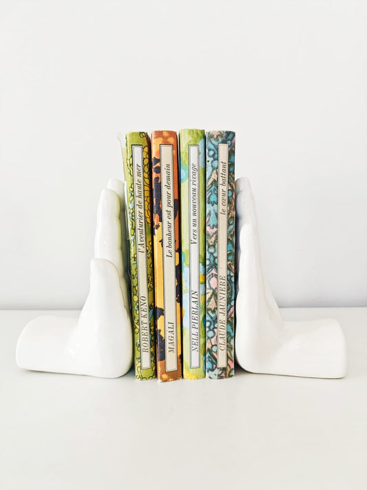 Serre-livres mains